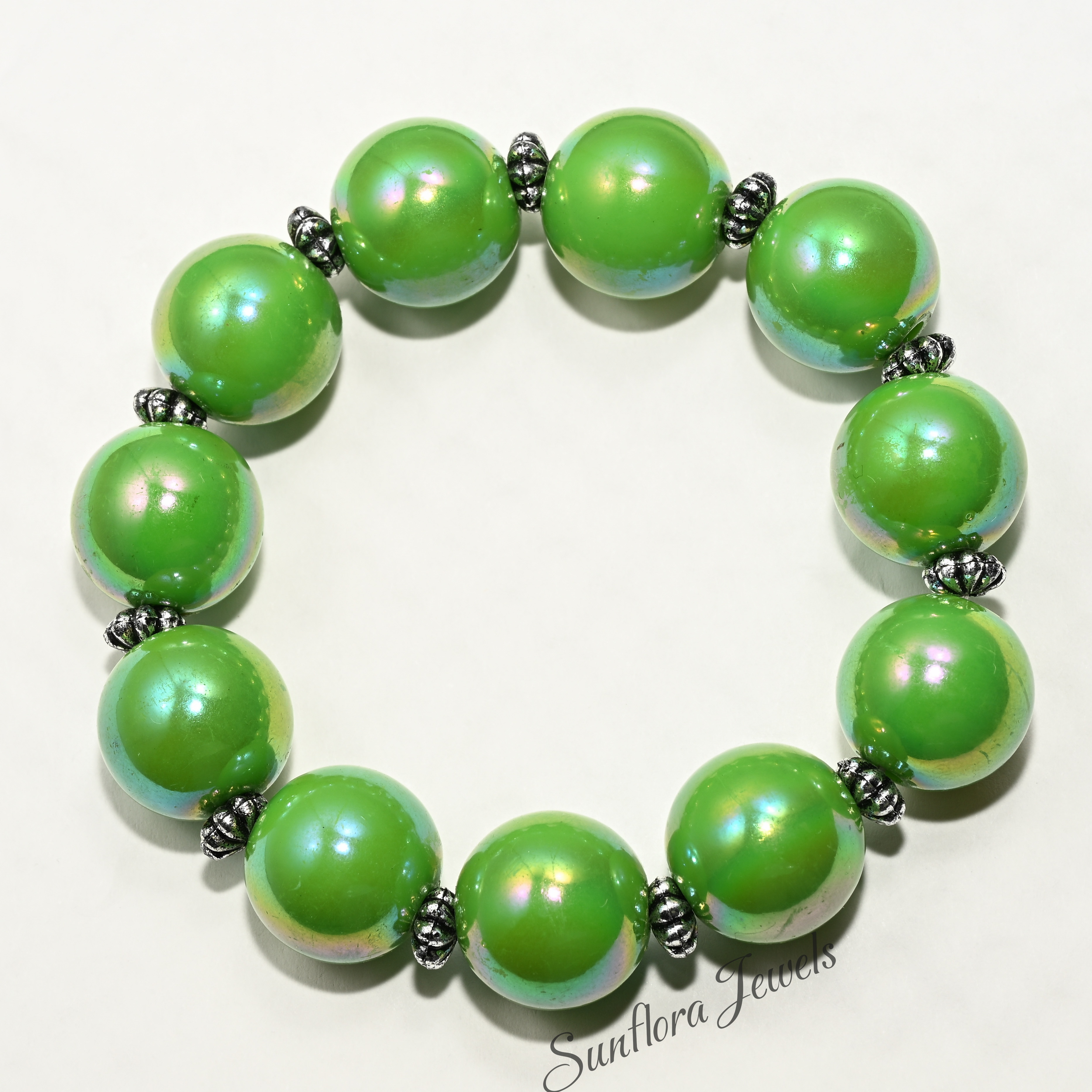Luminous Green Pearl Stretch Bracelet with Sterling Silver Spacers