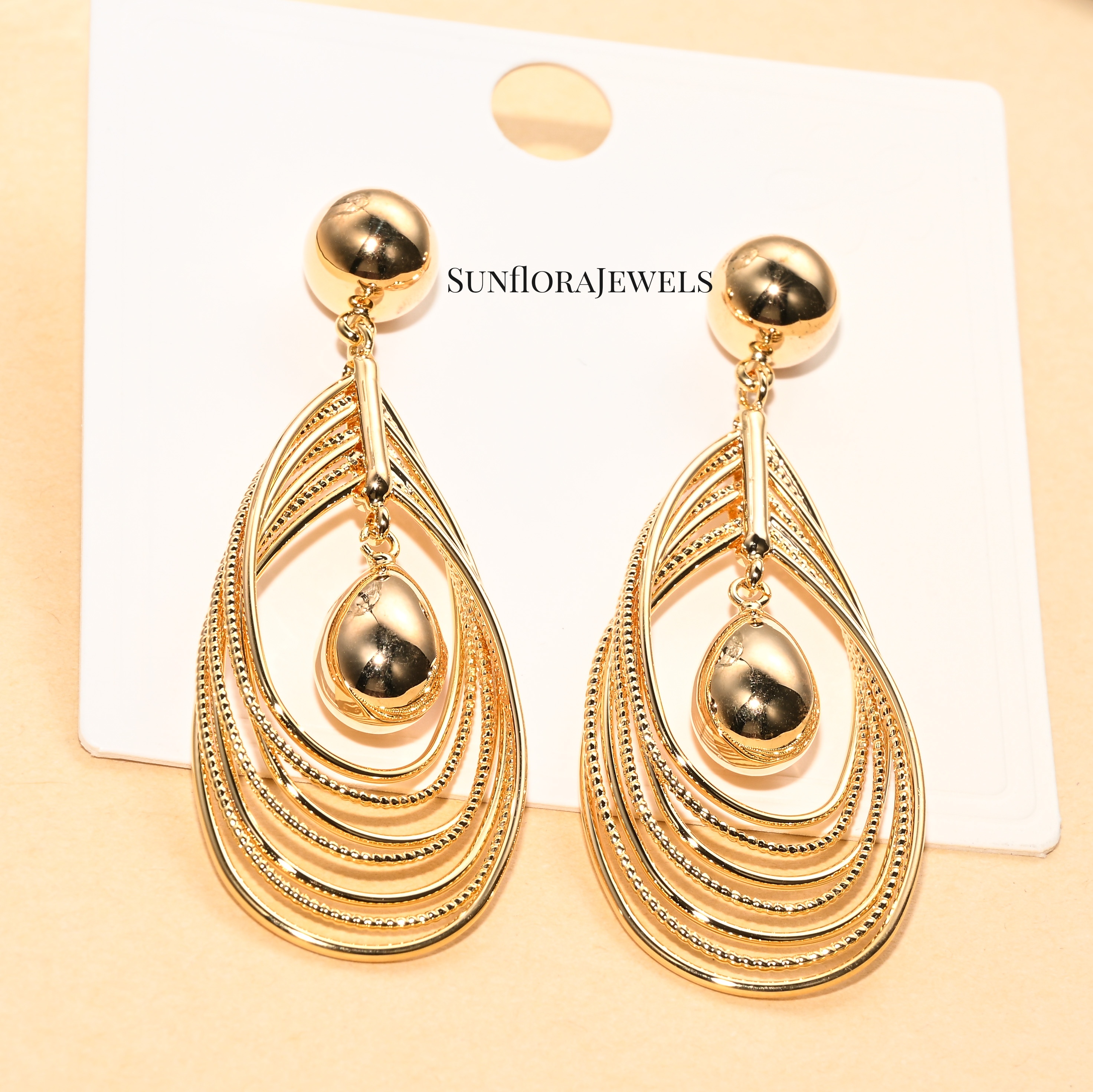 Elegant Gold Teardrop Charm Layered Earrings