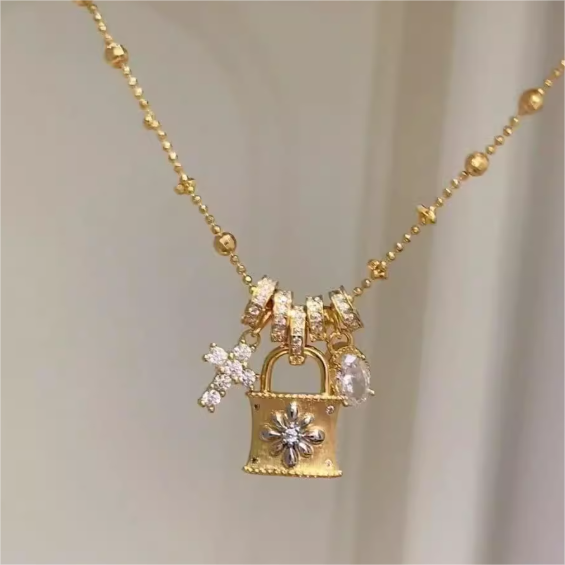 Elegant Gold Chain Necklace Featuring Lock Pendant and Diamante Accents