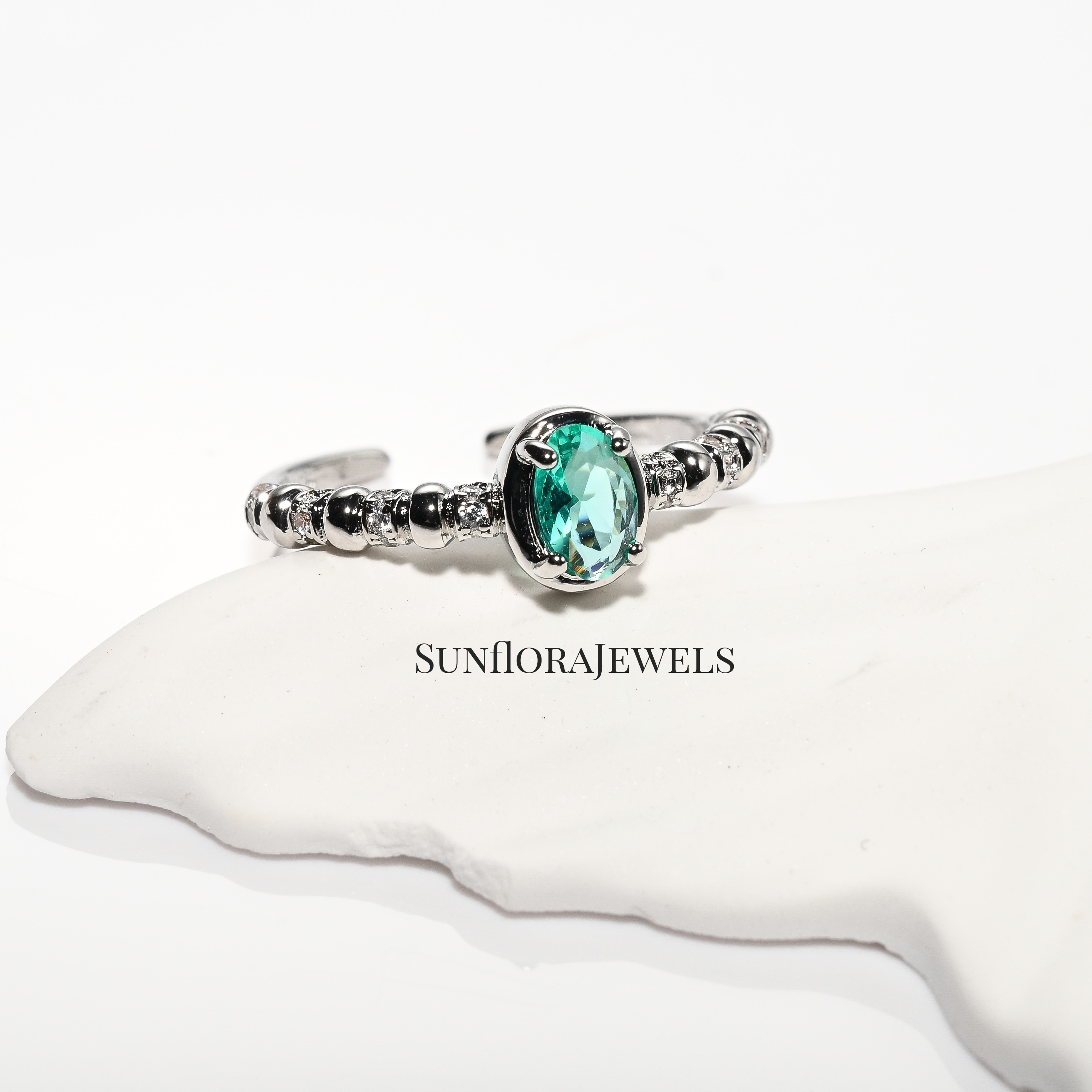 Silver Ring with Oval Blue Gemstone