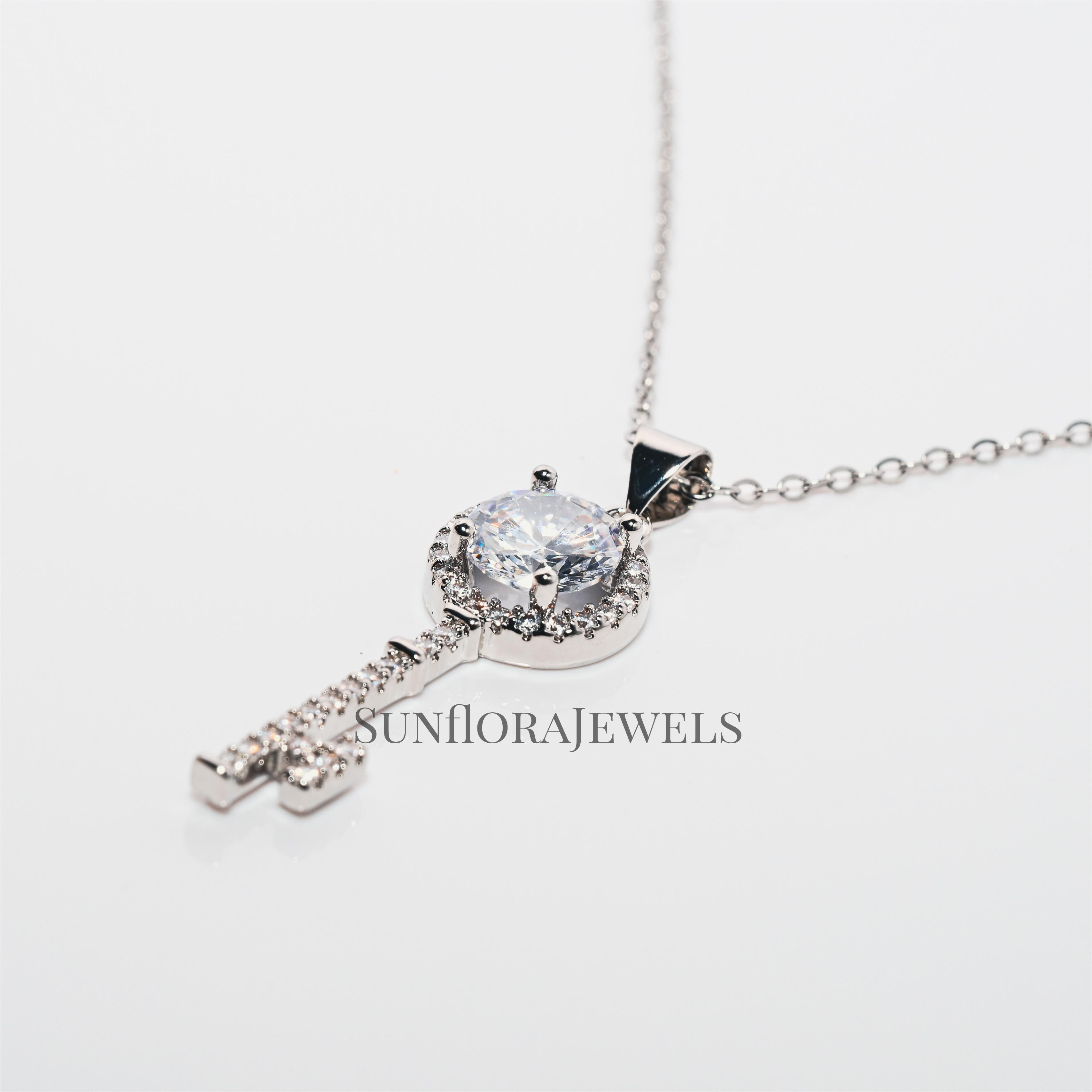 Silver Key Pendant Necklace with Crystal Accent