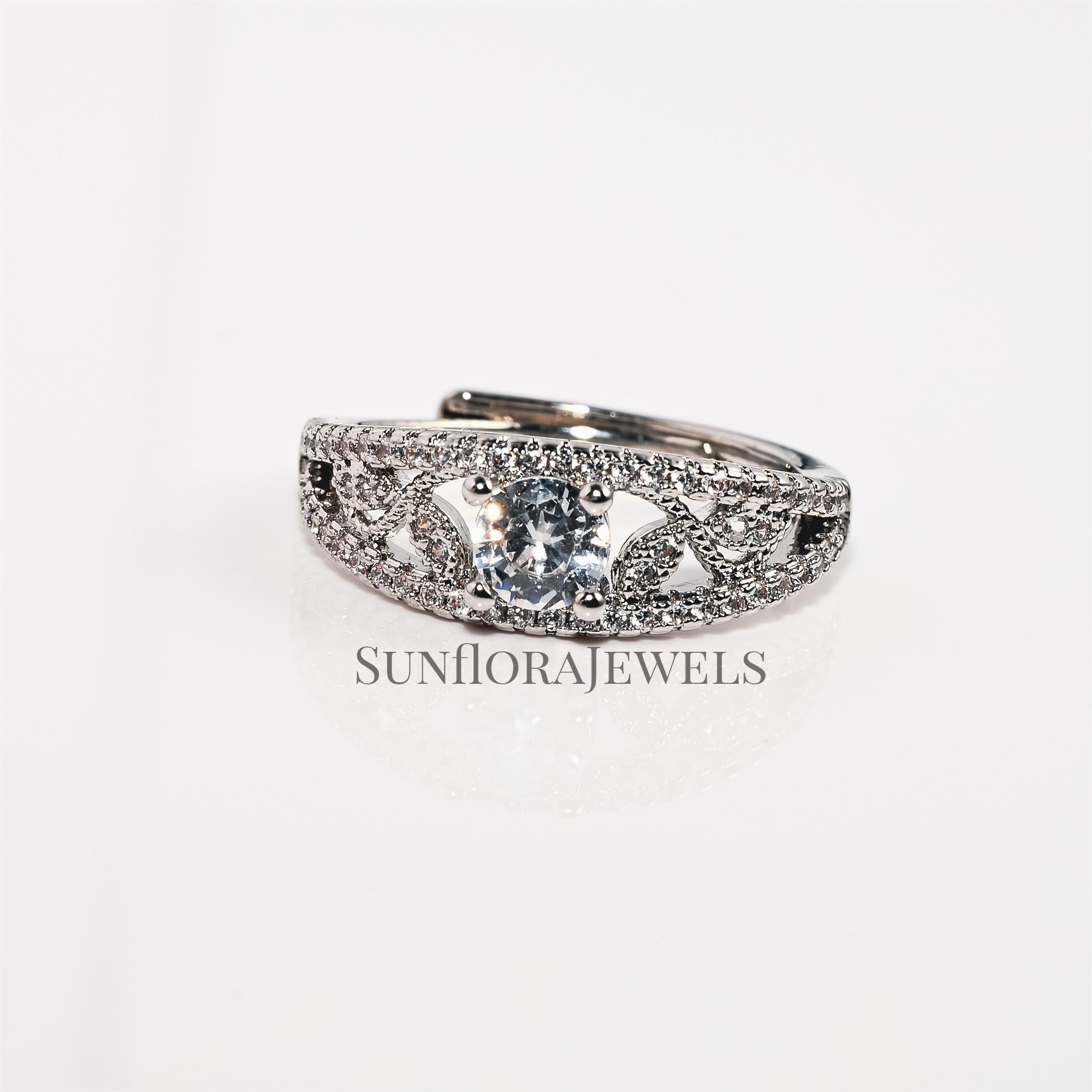 Elegant Blue Crystal Inlaid Hollow Silver Ring