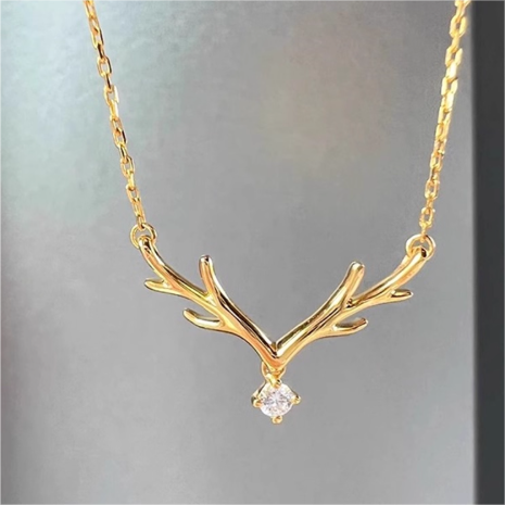 Golden Antler Necklace with Crystal Pendant
