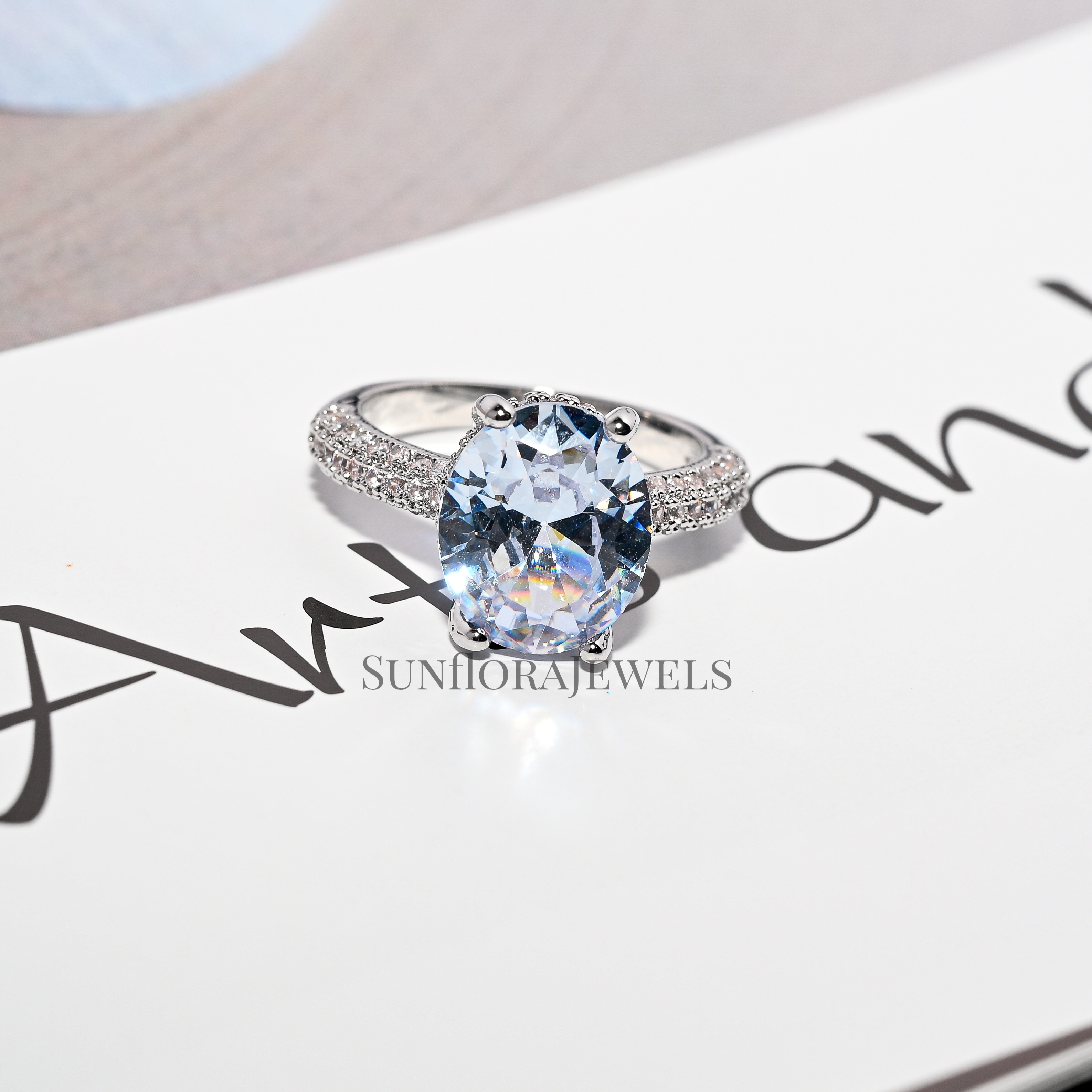 Elegant Oval Cut Cubic Moissanite Ring-Silver Plated with Side Stones for Women